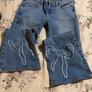 Abercrombie and Finch girls Blue Embroidered Bow Bootcut Jeans